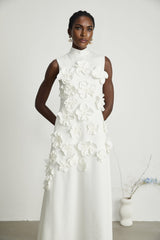 Sleeveless white maxi dress with bow and artificial flower embellishment named Magali