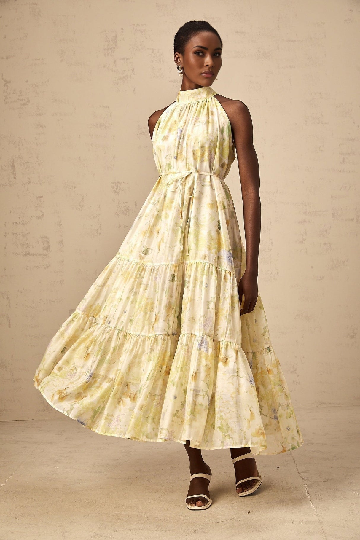Sleeveless yellow midi dress with floral print pattern named Ulani