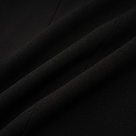Stylish black blazer with bowknot detail and cutout design