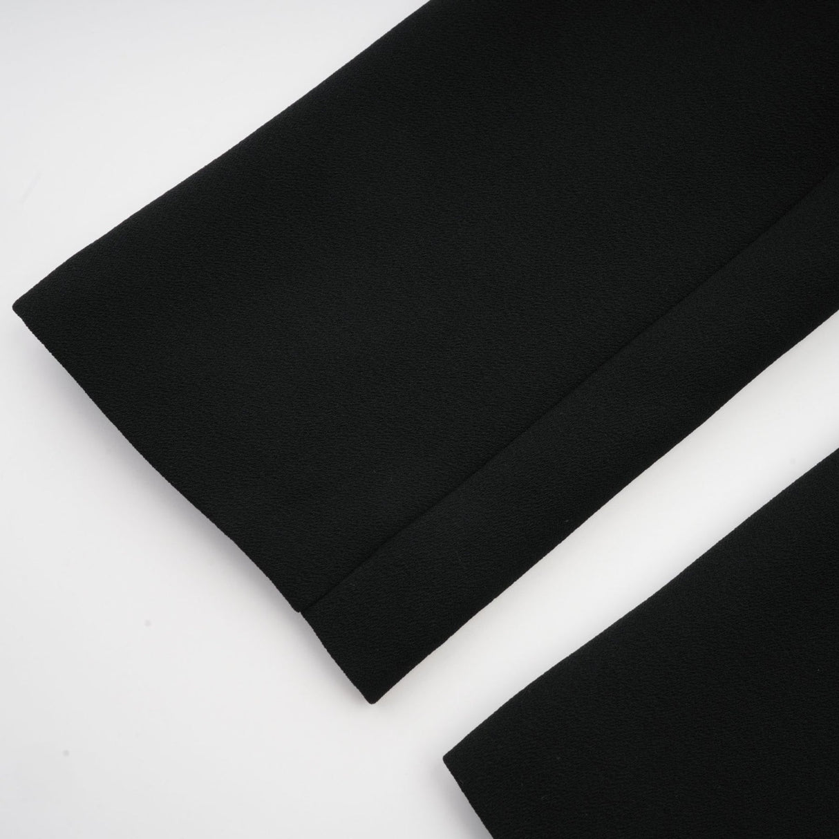 Suzanne black pleated jacket  trousers matching set