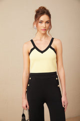 Three piece matching set including knit cardigan vest and trousers with contrasting trim in Eloise style