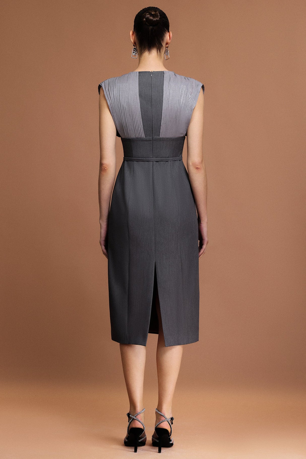 Tullia Gray V-neckline draped bodice midi dress with unique folds and stylish belt for formal occasions