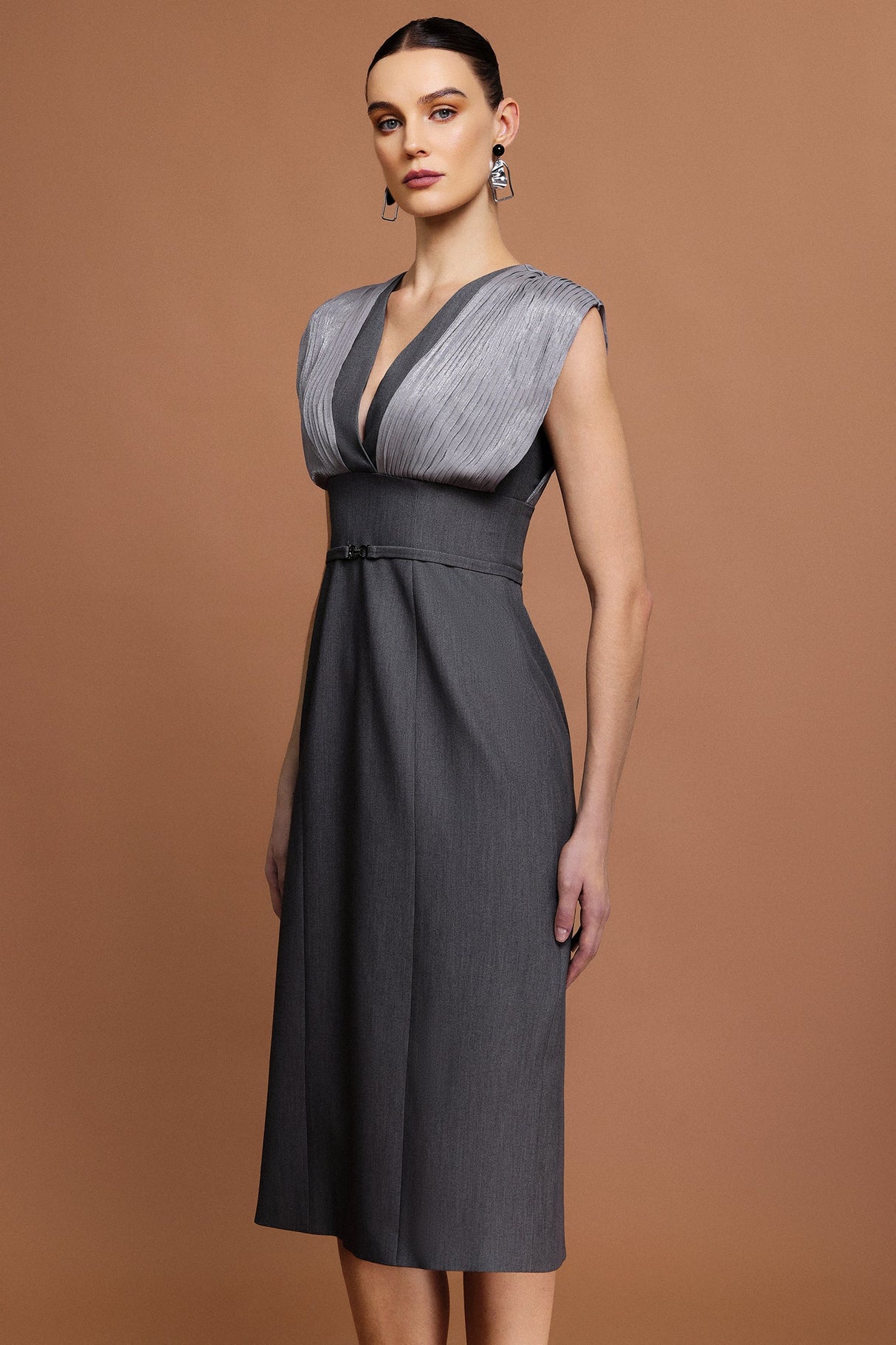 Tullia Gray V-neckline draped bodice midi dress with unique folds and stylish belt for formal occasions