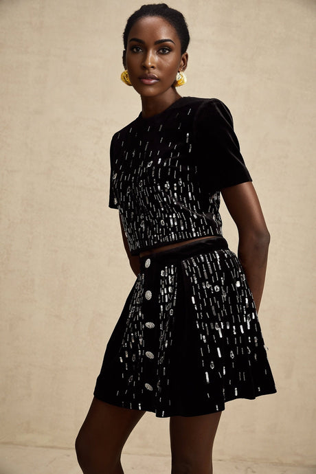 Two piece outfit set with black velvet top and skirt featuring embellishments named Isabeau