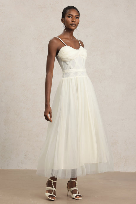 Valerie White Halterneck Formal Dress with Intricate Detailing and Flowing Skirt