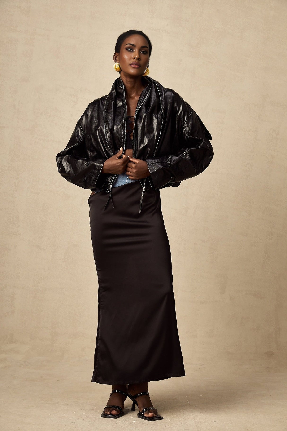 Virginie Black Cropped Faux Leather Jacket With Puff Hem