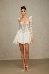 Vivienne white mini dress with floral lace pattern and corset style bodice on a mannequin