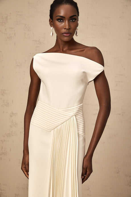 White asymmetric draped midi dress with flowing fabric and uneven hemline