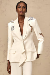 White blazer and trousers set with butterfly applique embellishments
