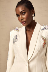 White blazer and trousers set with butterfly applique embellishments