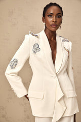 White blazer and trousers set with butterfly applique embellishments