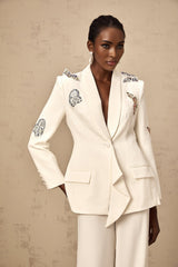 White blazer and trousers set with butterfly applique embellishments