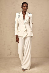 White blazer and trousers set with butterfly appliques and embellishments