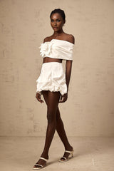 White floral print matching set with pleated top and skirt by Honorine