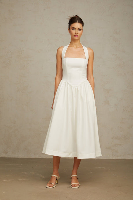 White halterneck midi dress with pleated design and Alizee style