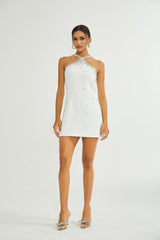 White lace embellished mini dress with floral pattern and short sleeves named Xanthea