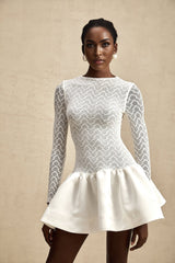 White lace mini dress with panel details and short length