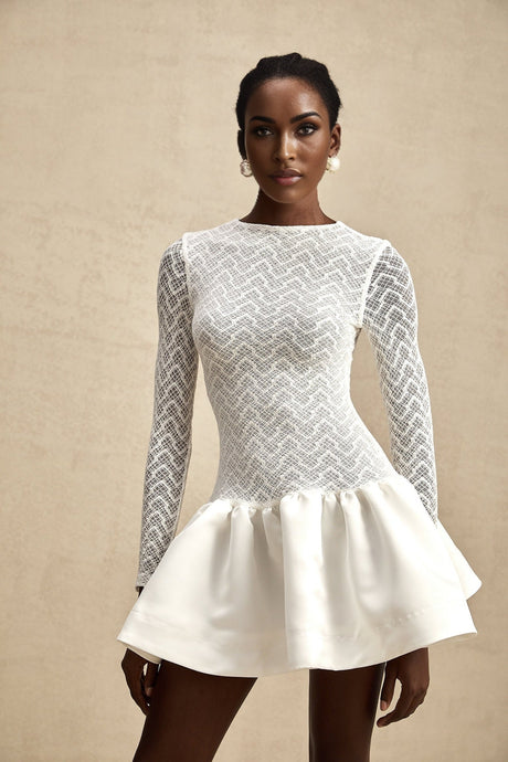 White lace mini dress with panel details and short length