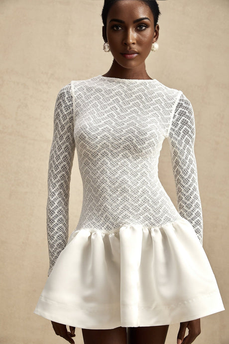 White lace mini dress with panelled design and short length called Oceane