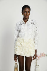 White long sleeve shirt with lace embroidery details and strategic cut out sections