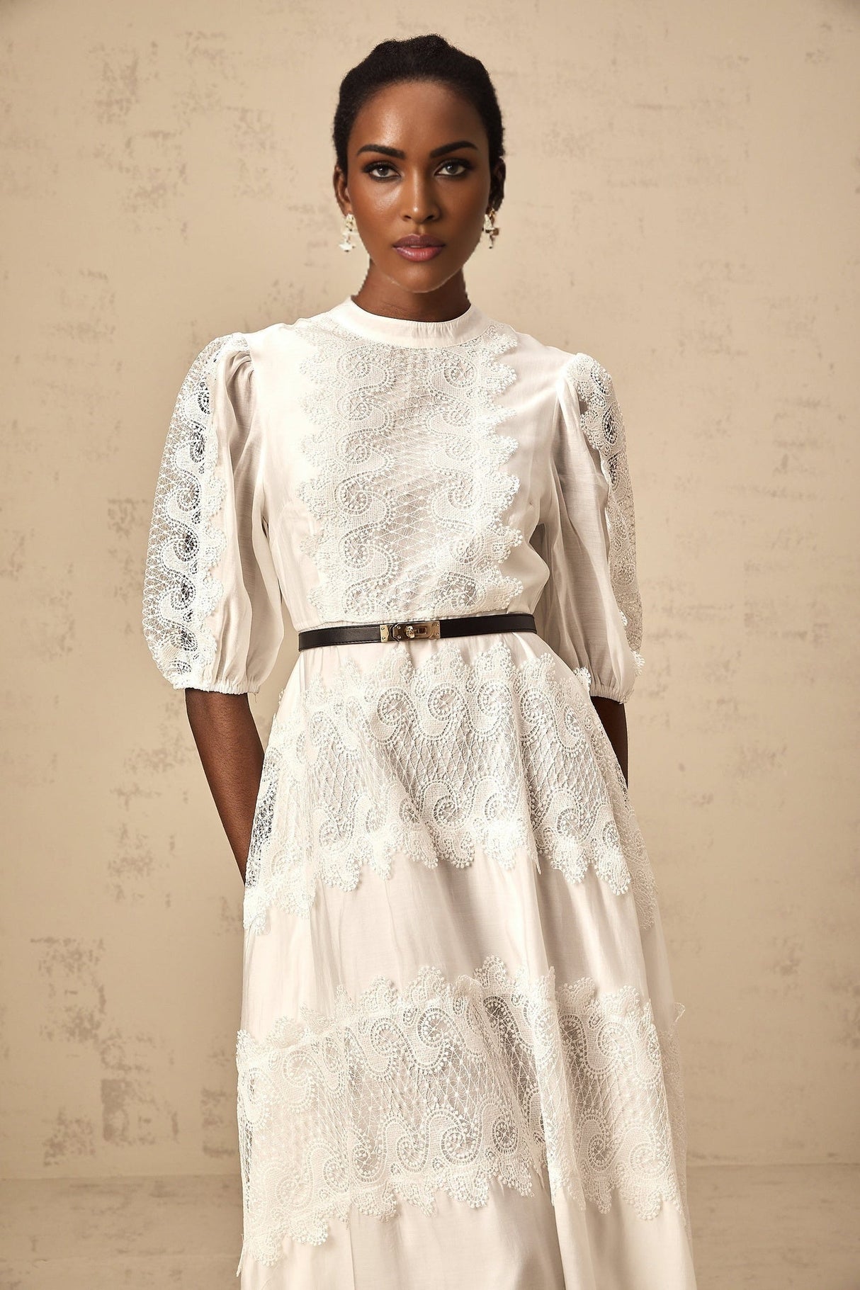 White midi dress with lace trim panels and belt at waist