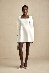 White mini dress with crystal embellishments and Aline silhouette called Angelique