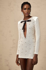 White mini dress with cut out details and bowknot embellishment named Adalasia