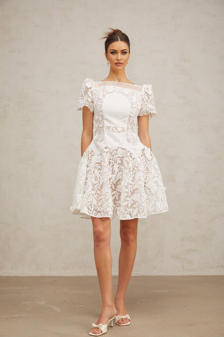 White mini dress with floral lace pattern and puff sleeves Josette design