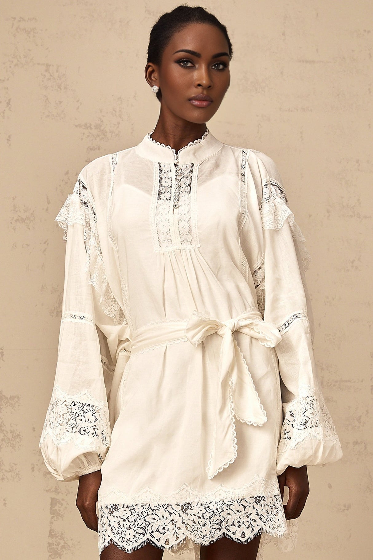 White mini dress with floral lace trim details