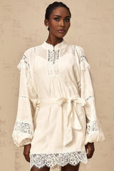 White mini dress with floral lace trim details