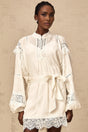 White mini dress with floral lace trim details