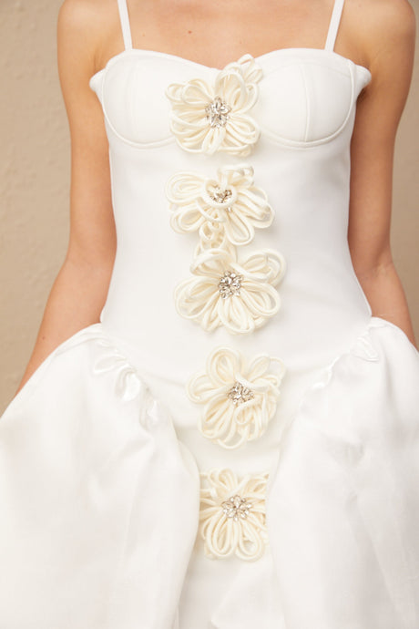 White mini dress with floral pattern and bustier style top