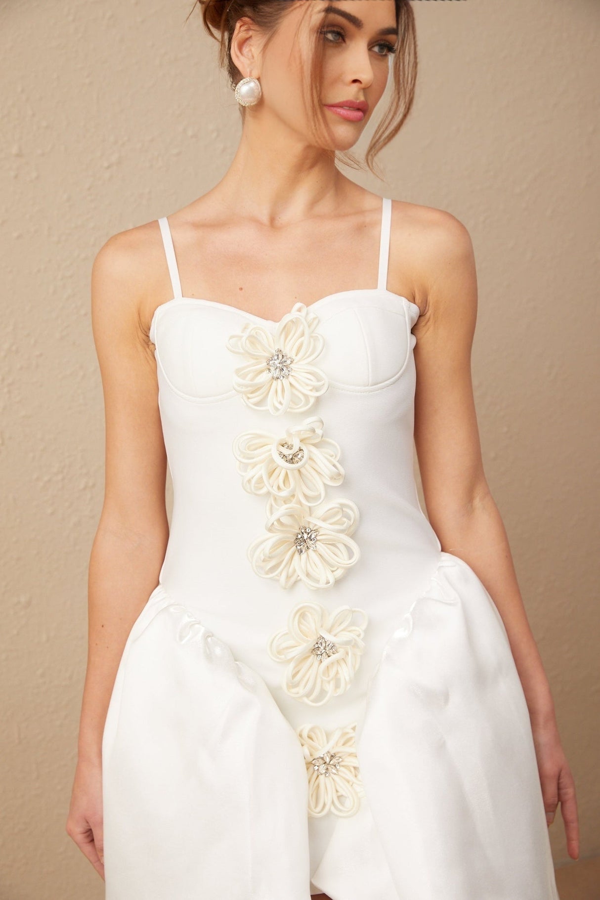 White mini dress with floral pattern and bustier style top