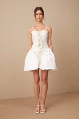 White mini dress with floral pattern and bustier top