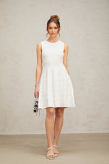 White mini dress with star pattern knit fabric and jasmine design elements