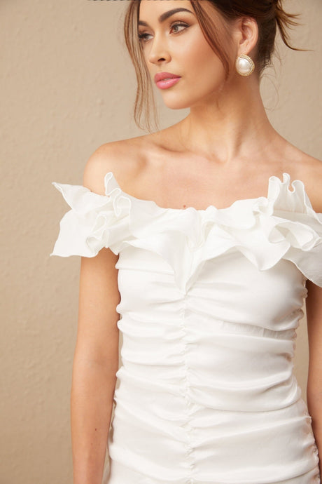White off shoulder mini dress with ruffles named Aissatou