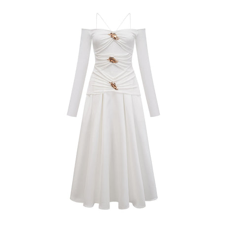 White offshoulder maxi dress with panels worn by model standing in relaxed pose