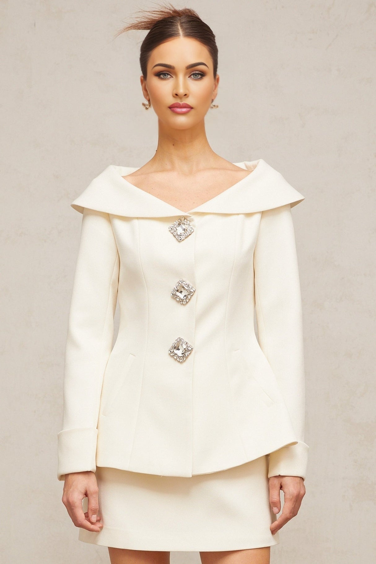 White peplum jacket and matching skirt set named Eugenie