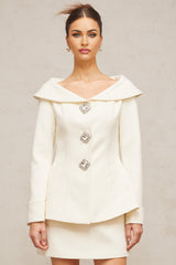 White peplum jacket and matching skirt set named Eugenie