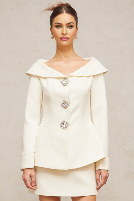 White peplum jacket and matching skirt set named Eugenie