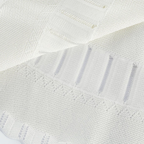 White pleated mini dress with cutouts by Noemie