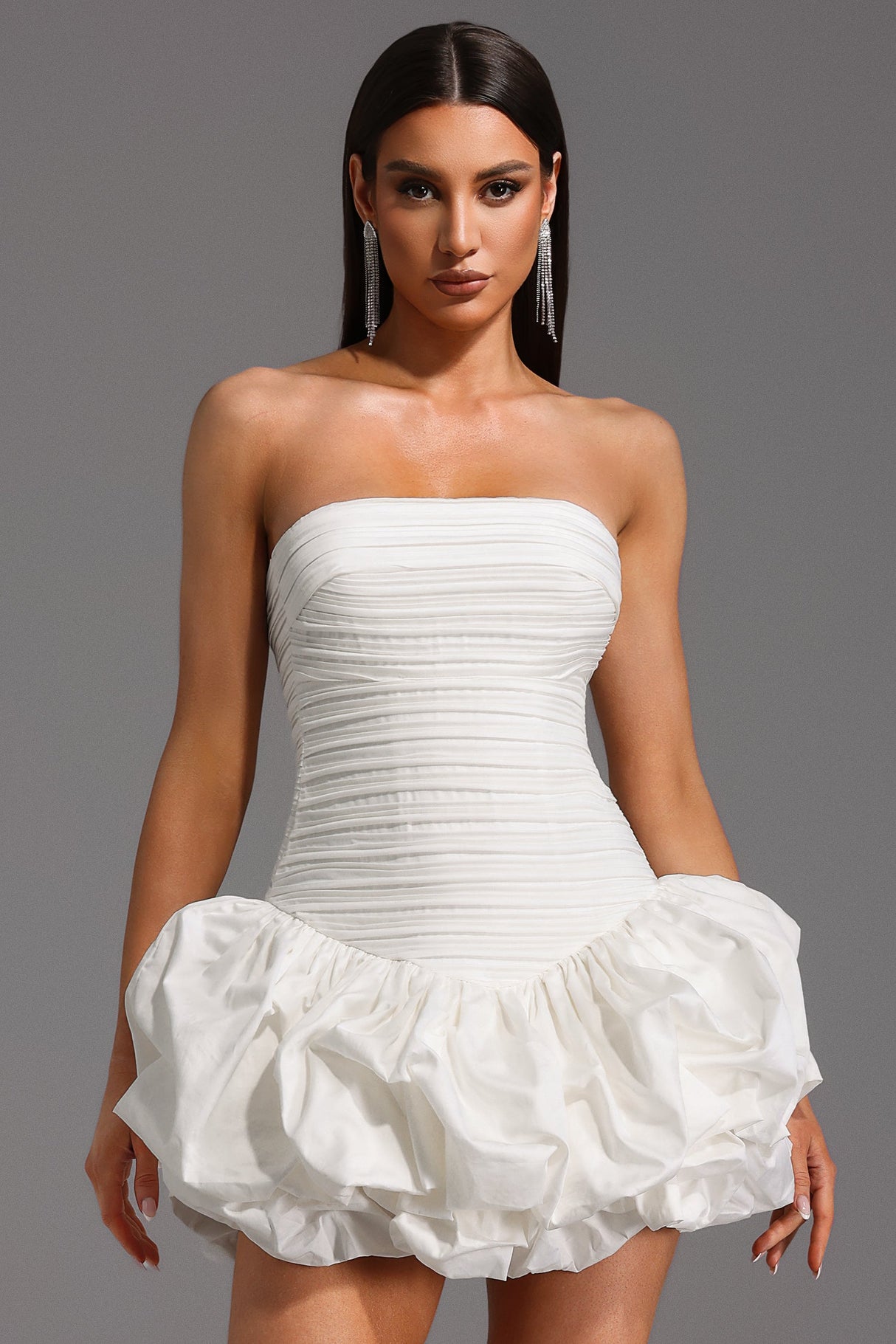White Rakani Sleeveless Fold Bud Mini Dress with Strapless Neckline and Ruffle Hem