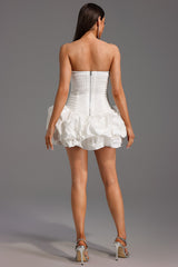 White Rakani Sleeveless Fold Bud Mini Dress with Strapless Neckline and Ruffle Hem