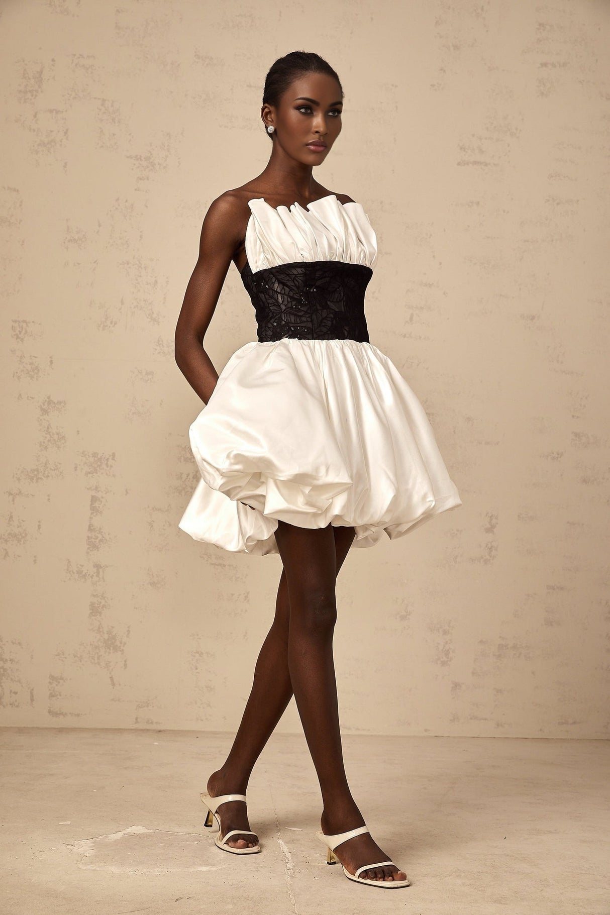 White satin mini dress with lace panels and puff sleeves called Eliane