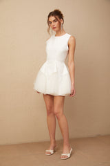 White short dress with puff sleeves and tulle panels featuring a mini length and Assunta design