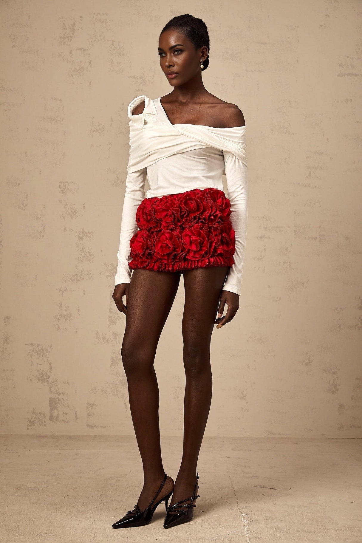White sleeveless jersey top with asymmetric design and twisted fabric detail