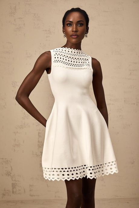 White sleeveless knitted mini dress with cutout details named Colette
