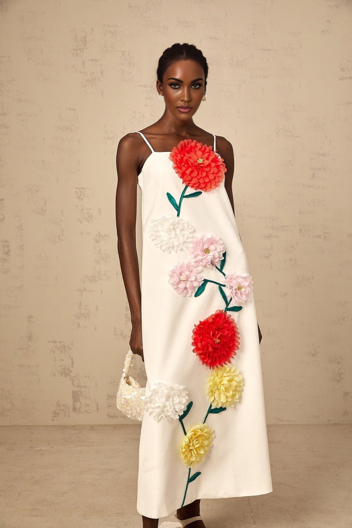 White sleeveless midi dress with three dimensional floral petal details