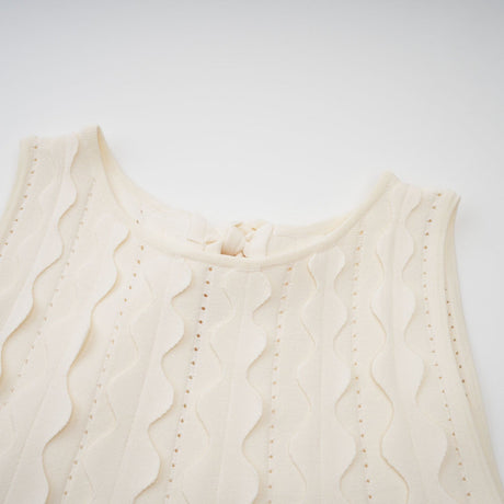 White sleeveless mini dress with wavy details named Axelle