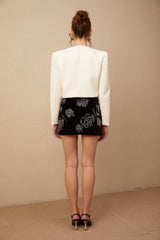 White tweed jacket with crystal embellishments called Nerina